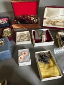 A large selection of boxed costume jewellery, various styles and makers.