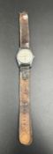 A vintage Ralco wristwatch on leather strap.