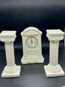 Belleek candlesticks and a clock