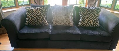 A contemporary black velvet four seater sofa (H80cm W260cm D120cm)