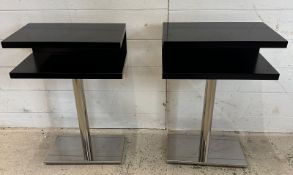 Two contemporary black side tables on chrome pedestals (H57cm W40cm D25cm)