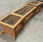 A wicker and cane conservatory set, consisting of a table and three chairs (H40cm W92cm D40cm