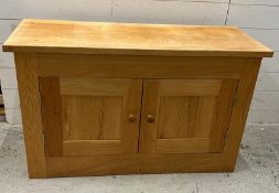 An oak sideboard or hall storage unit (H64cm W108cm D42cm)