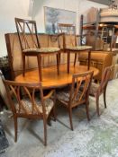 A G-Plan extendable oval dining table and six chairs to include carvers (H72cm W165cm D106cm)