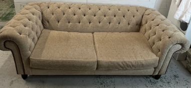 A three seater button back Chesterfield style sofa (H72cm W206cm D96cm)