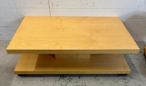 A light wood contemporary two tier coffee table and two matching side tables (Coffee table H38cm