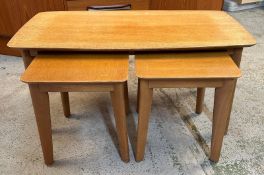 A nest of three teak Mid Century side tables (H42cm W89cm D43cm)