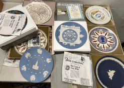 A collection of collectable plates various makers and design