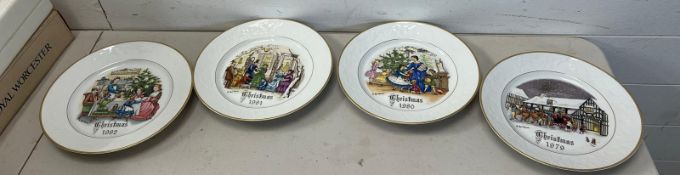 Four Royal Worcester year plates