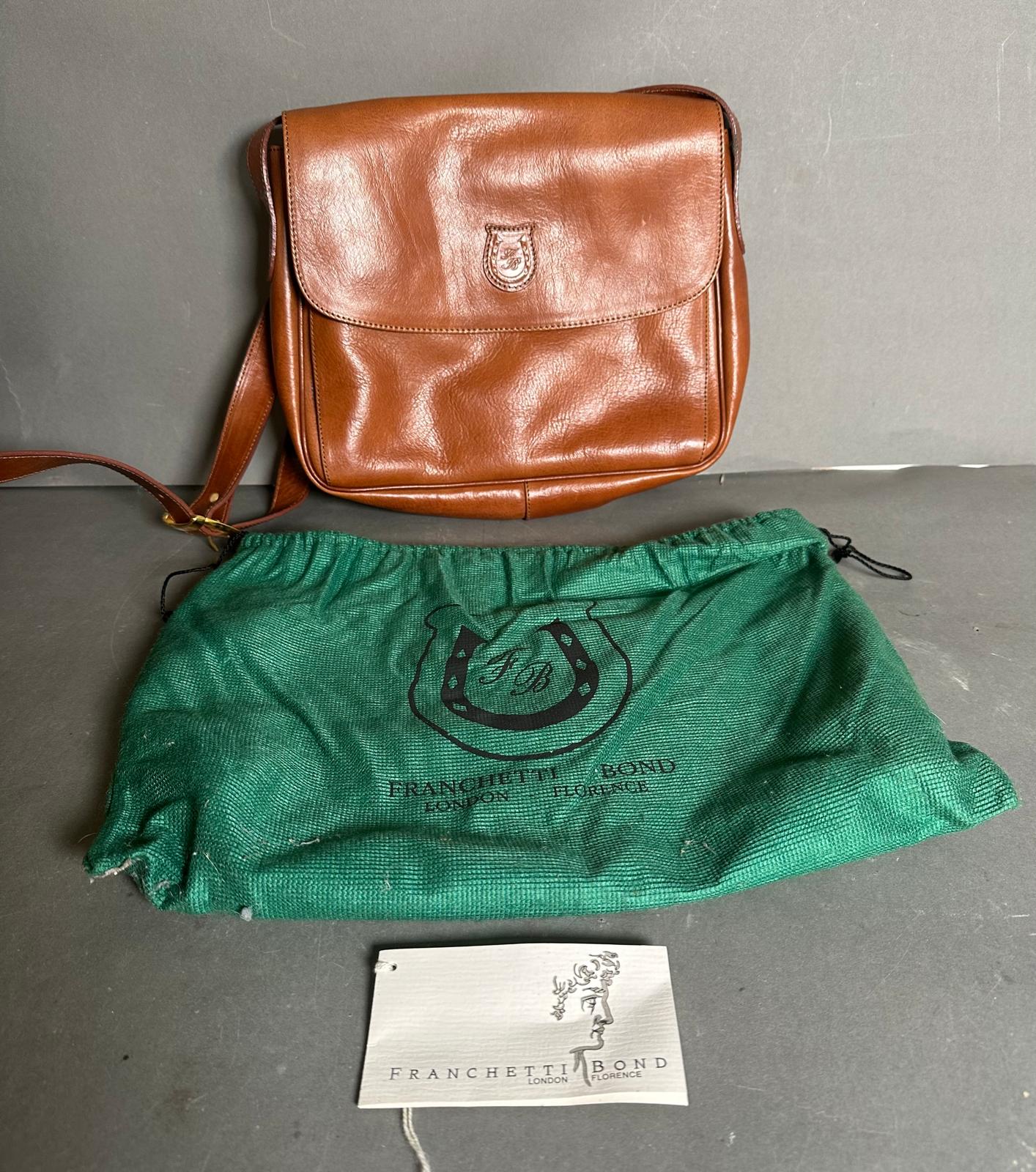 A brown leather Franchetti Bond satchel handbag with dust cover