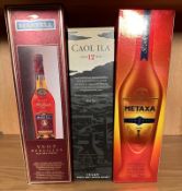 Three Boxed bottles of spirits, a Martel V.S.O.P, a 12year old bottle of Caol Ila and a bottle of