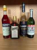 Four bottles of spirits to include Cointreau, Perned and Campari