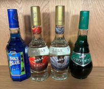 A selection of Bols liquors to include Bas Blue Kirsan and Peppermint