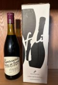 A boxed bottle of Sachetto Prosecco and a bottle of Super Cassis