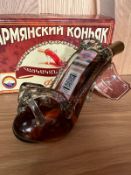 A bottle of Fransz Armenian Armagnac in souvenir shoe bottle