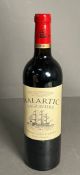 A bottle of Chateau Malartic Lagraviere Grand Cru Classe Pessac-Leognon 2014