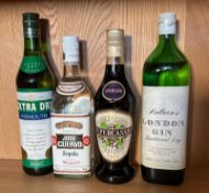 Four bottles of spirits, a Vermouth, Jose Cuevve Tequila, Super Casis and a Hollorns dry Gin