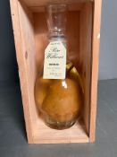 Poire William Carafon Eau De Vue 70cl presented in a traditional bottle including a pear, A French
