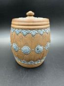 A Doulton Lambeth Silicon lidded tobacco jar marked 1881, approximately 13cm H