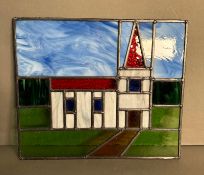 A stained glass panel of a church 40cm x 33cm
