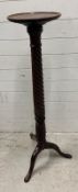 A mahogany Torchière jardiniere H132cm