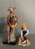 Two Royal Doulton figures of Tom Sawyer and The Jester