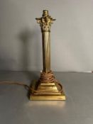A Corinthian column brass table lamp. Height 41