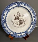 A large Royal Doulton coat of arms plate in blue and white (some chips to rim)