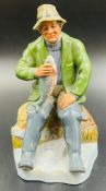 A Royal Doulton figure of a fisherman titled 