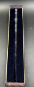 A boxed decorative magic wand