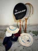 Two vintage wooden tennis rackets and sporting hats