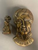 Two antique door knockers one George IV and the other A Beckett