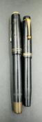 Two vintage fountain pens, one Parker.