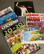 A selection of sporting magazines to include cricket and football along with two 2014 world cup