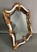 A gilt and white painted easel backed table mirror in the Rococo style AF