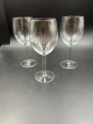 Twenty four wine glasses