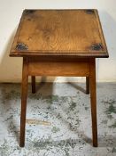 An Arts and Crafts table with square top and carving to each corner (H66cm Sq45cm)