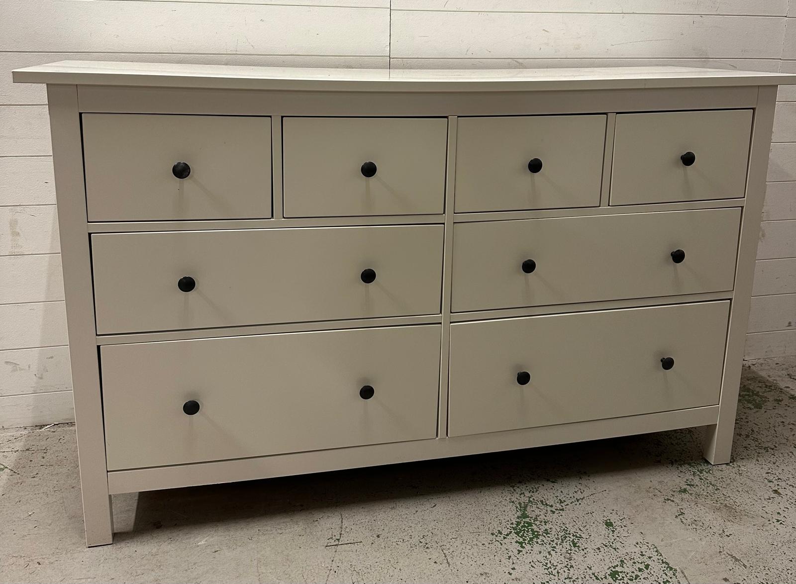 A large white sideboard comprising of four short drawers over four long (H95cm W162cm D51cm)