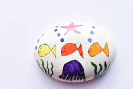 A Pebble hand painted by Olympian and TV Presenter and Personality Ellie Simmonds to raise funds for