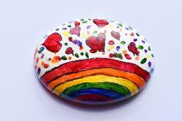 A Pebble hand painted by Sports Presenter Steve Sidwell to raise funds for the fantastic Momentum