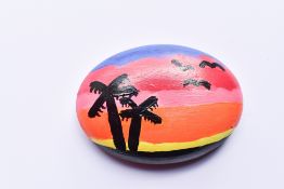 A Pebble hand painted by Footballer Alfie Gilchrist to raise funds for the fantastic Momentum