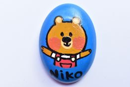 A Pebble hand painted by Illustrator Chris Chatterton to raise funds for the fantastic Momentum