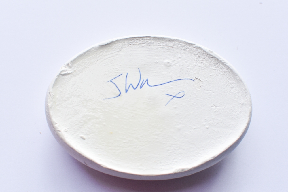A Pebble hand painted by Comedian and Podcast Host Josh Widdicombe to raise funds for the - Image 2 of 2