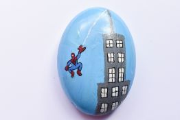 A Pebble hand painted by Actor Tom Holland to raise funds for the fantastic Momentum Children's