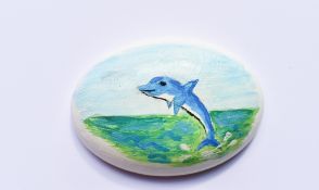 A Pebble hand painted by broadcaster Carole Malone to raise funds for the fantastic Momentum