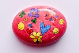 A Pebble hand painted by broadcaster Zoe Hardman to raise funds for the fantastic Momentum