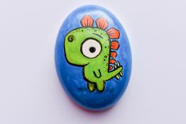 A Pebble hand painted by Children's Author and Illustrator Rob Biddulph to raise funds for the