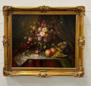 A contemporary still life of flowers in ornate frame, signed bottom right. Frame size 65 x 78 cm