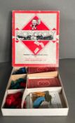 A vintage Waddington's Monopoly set with metal pieces
