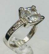 A silver fashion ring, size N